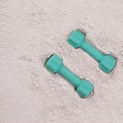 Image of a massage therapist massaging a client's hand.